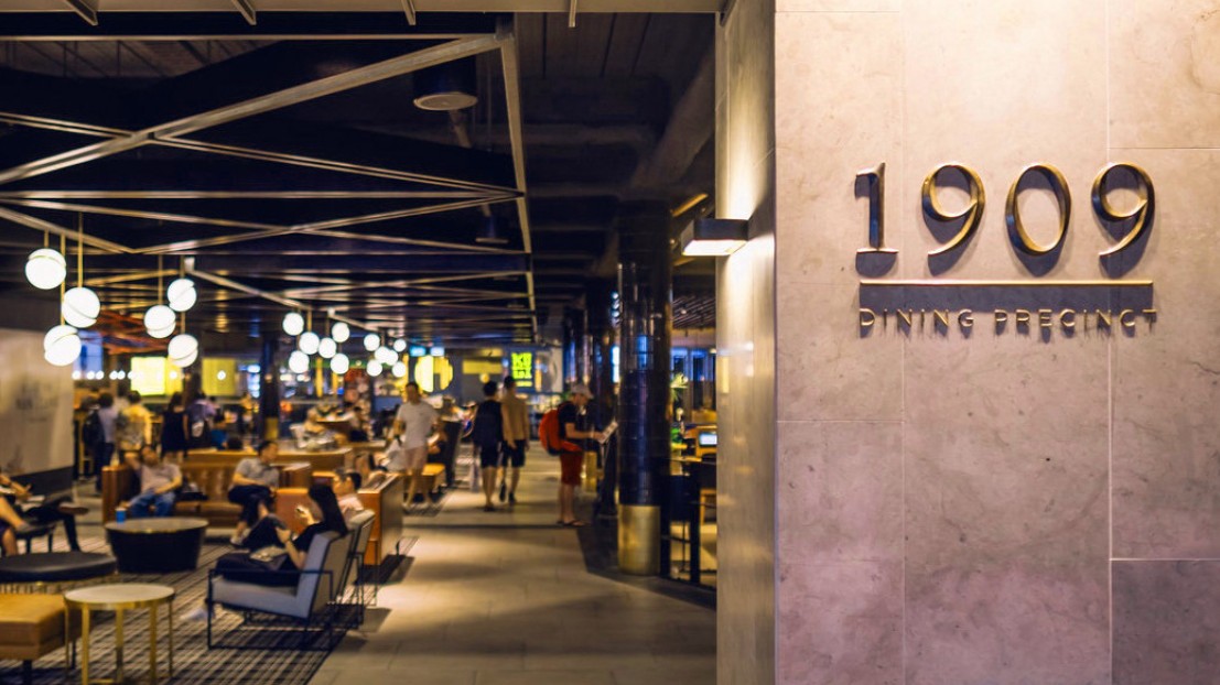 1909 Dining Precinct signage beside the dining hall