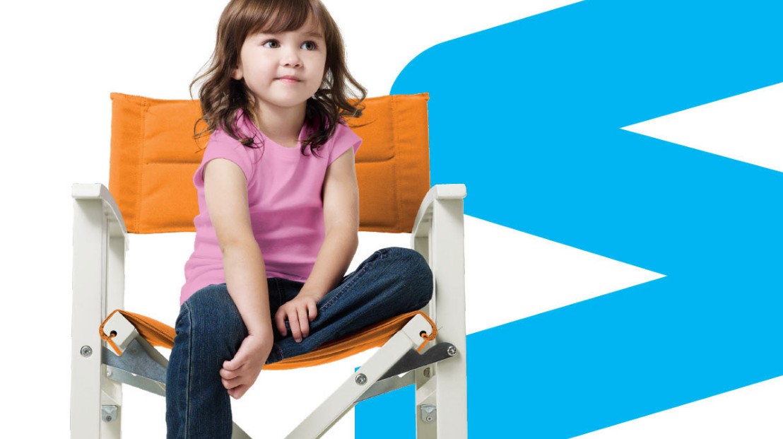 Big W store graphic of a child on an orange chair