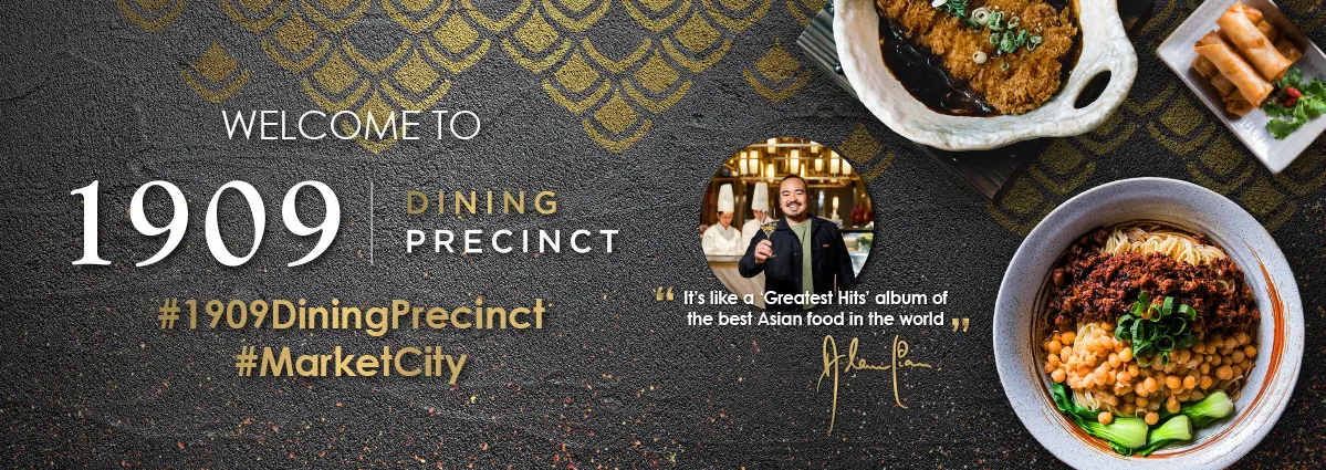 Wide hoarding: welcome to 1909 Dining Precinct, with a chef quote and food photography